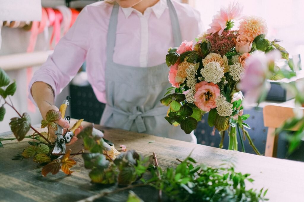 a person arranging flowers